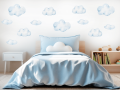 Dekoracyjne naklejki chmurki do pokoju dziecięcego – pastelowy błękit, akwarelowy styl, samoprzylepne i łatwe w aplikacji..png